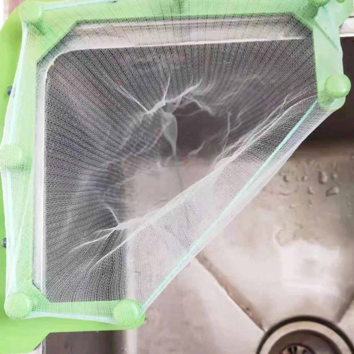 Merkloos Gootsteen Organizer - Gootsteen Afval Netje - Gootsteenontstopper - Spoelbak - Incl. 50 Netjes - Afbeelding 2